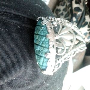 Sterling silver ring set with a larger turquoise stone size 8
